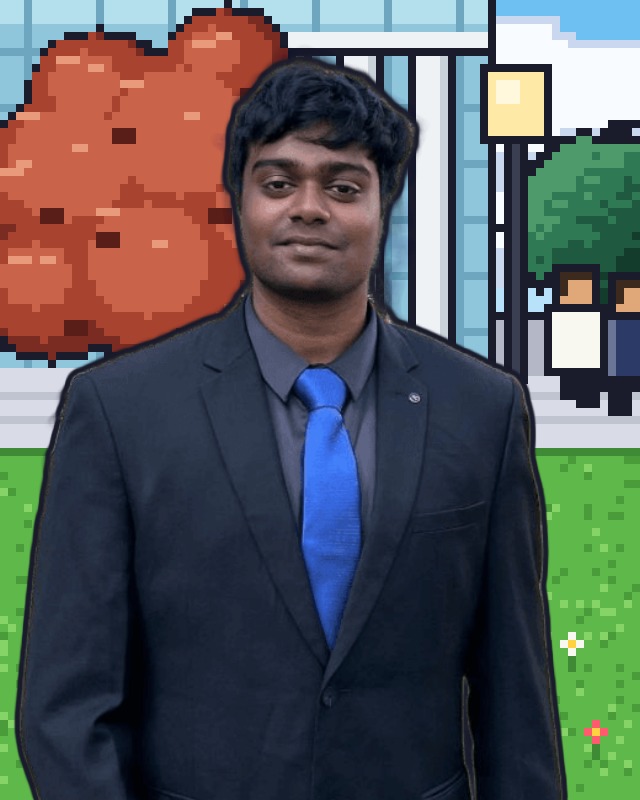 Shrinidhi KJ in a dark suit and blue tie, standing outdoors